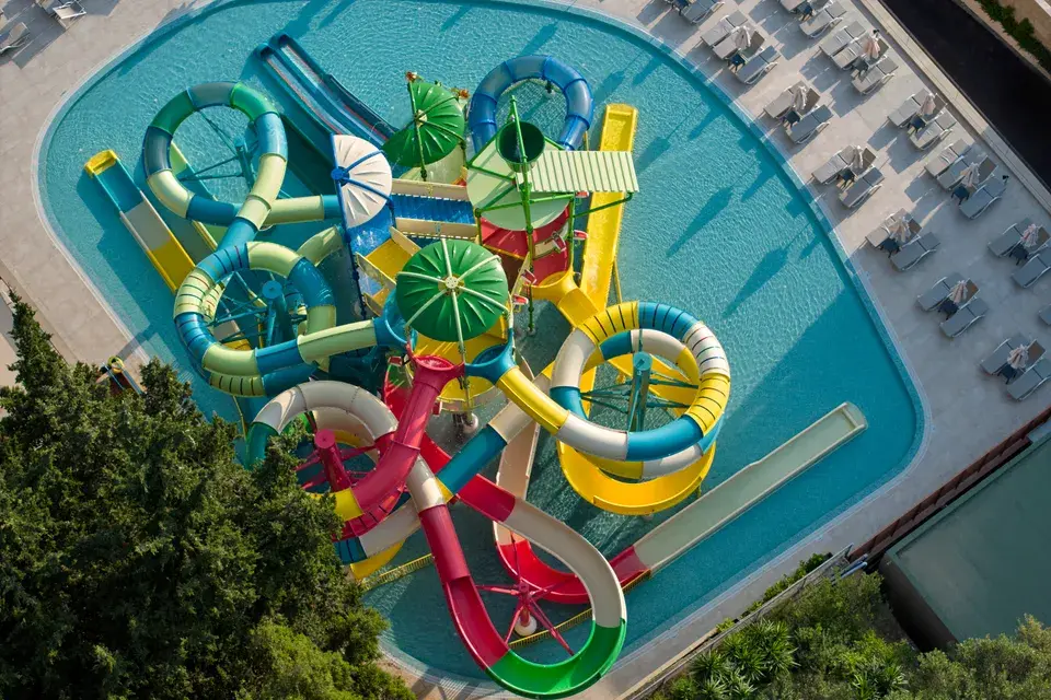 MarBella Anemelia Aqua Park from above, featuring many colorful tube slides